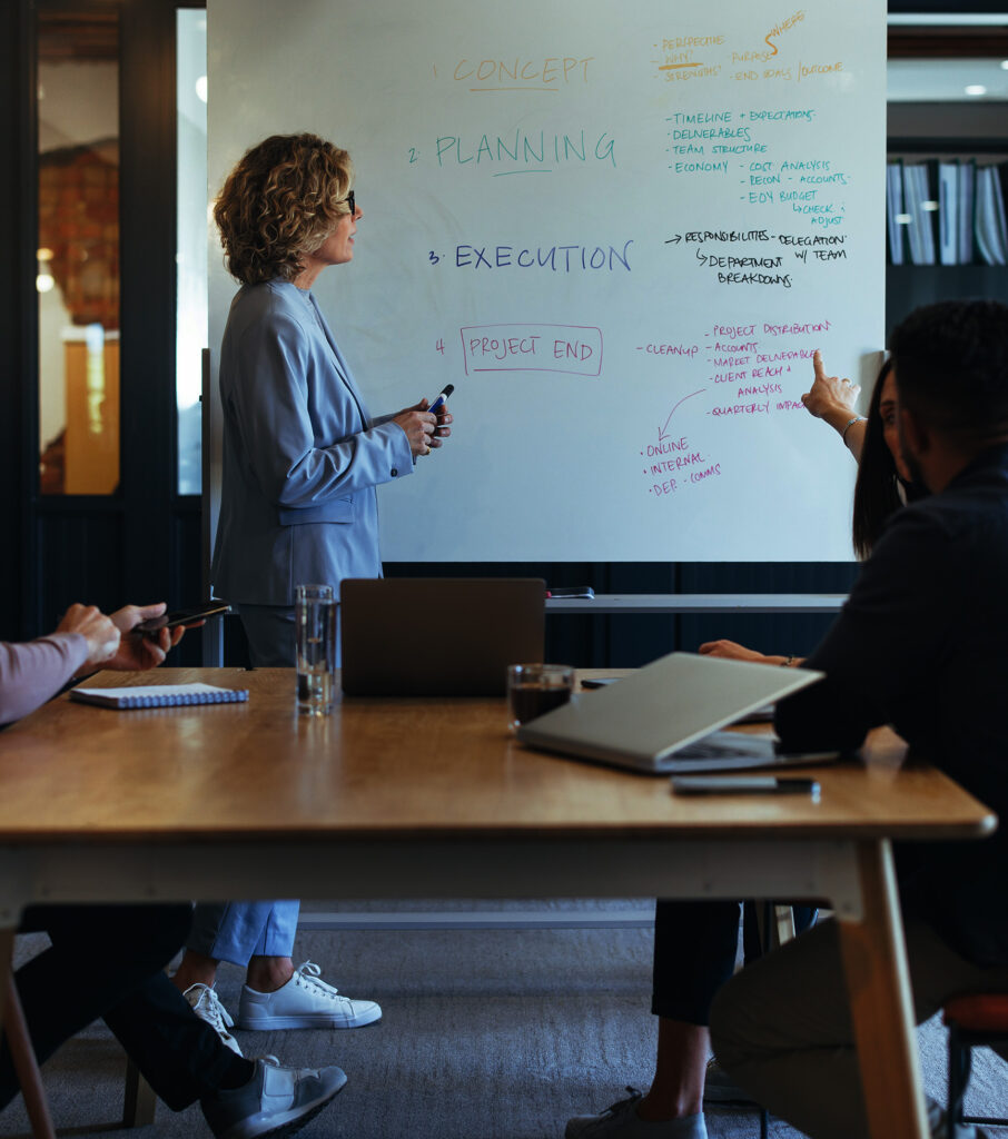 Business people having a discussion during a presentation